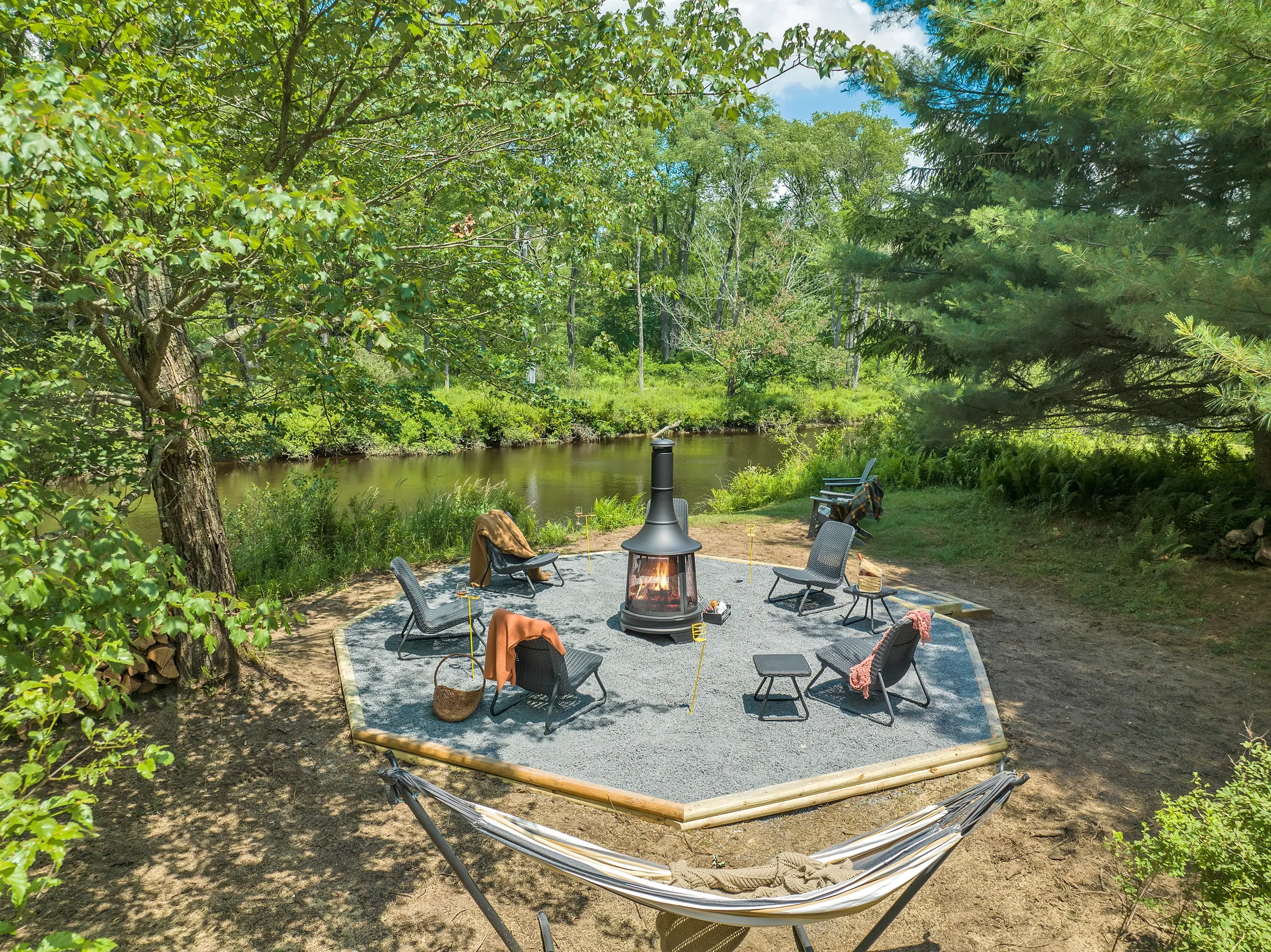 Enjoy direct backyard access to the Lehigh River, where calm, flowing water creates a serene and scenic backdrop for your Pocono getaway