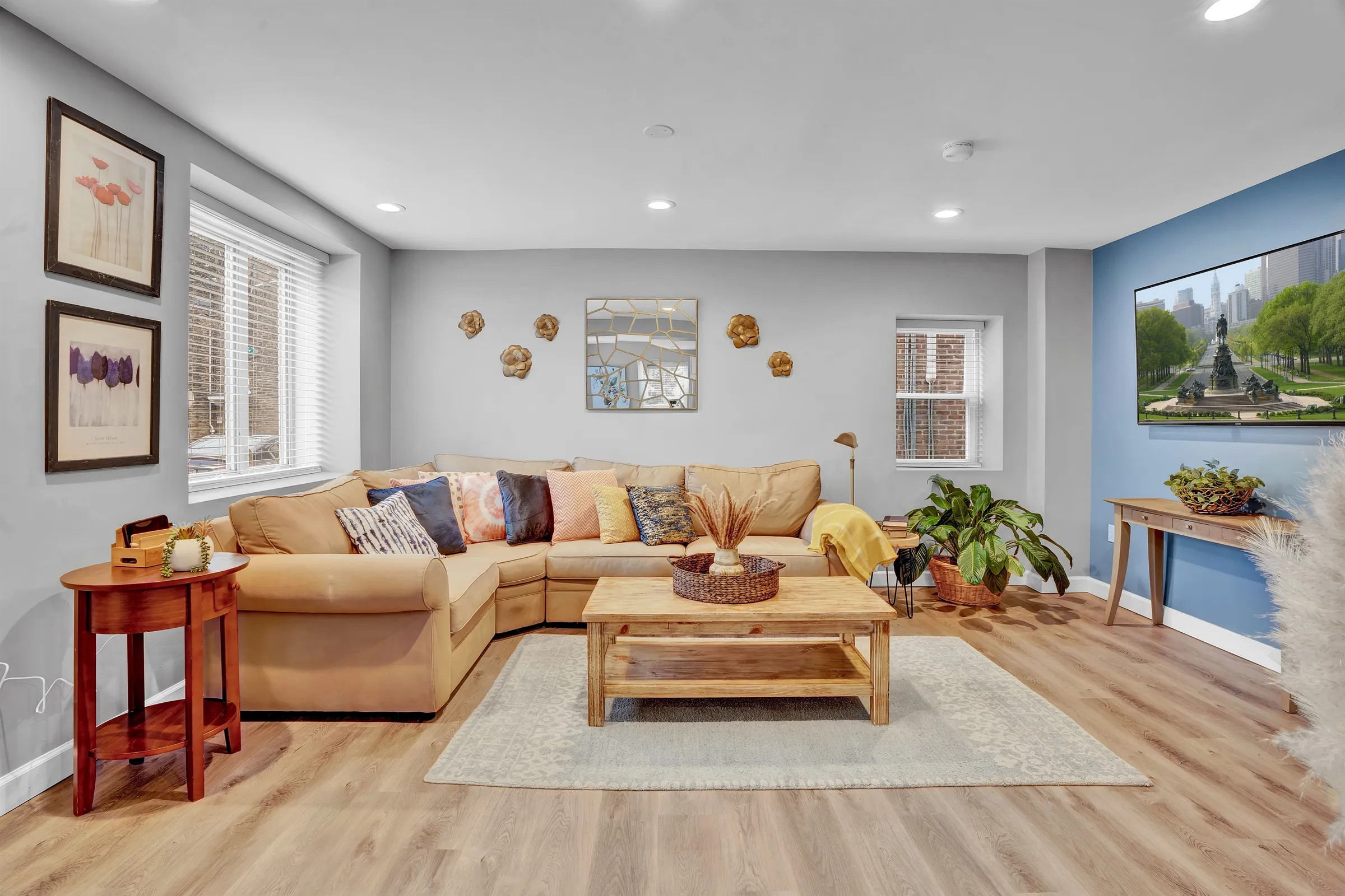 Spacious living room area with plenty natural light
