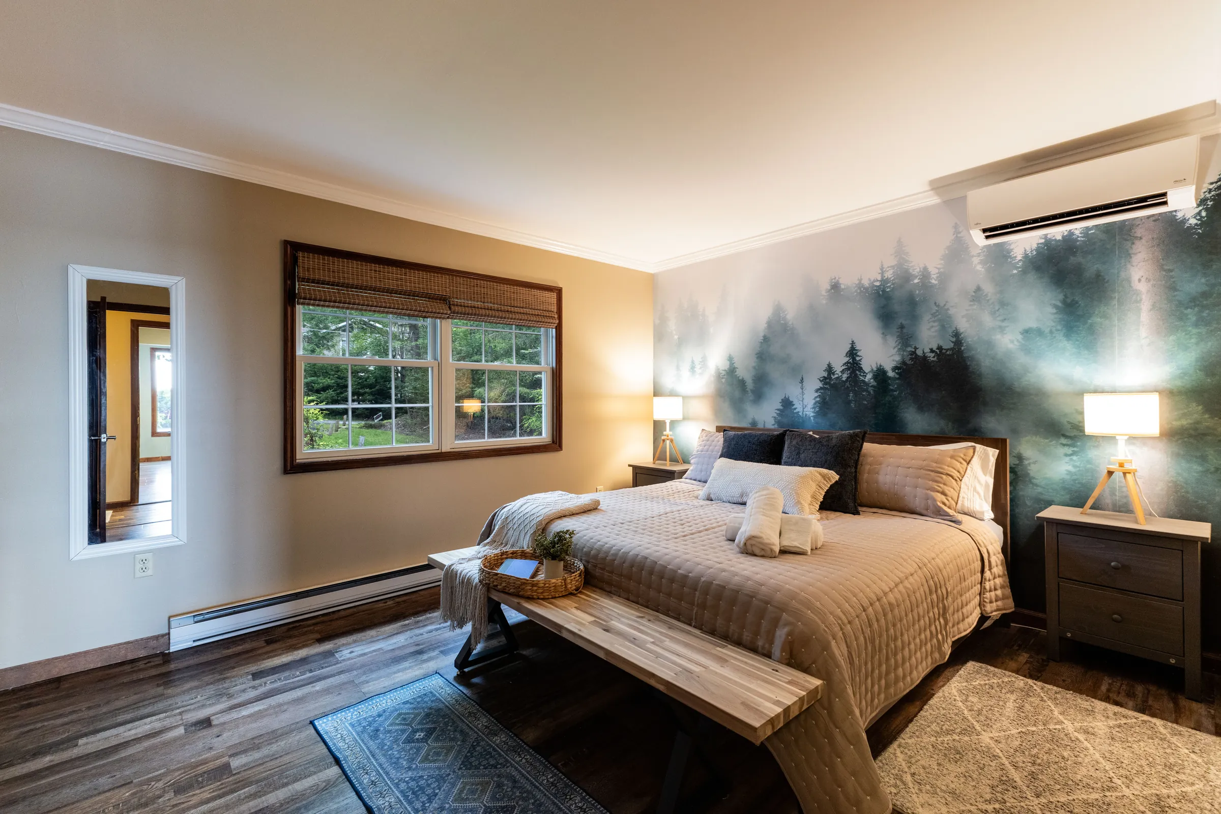 Retreat to the spacious upstairs king bedroom after a day of lakeside fun.