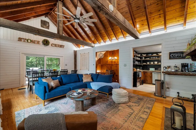 Gather beneath soaring wood ceilings in the heart of Stone Crest.