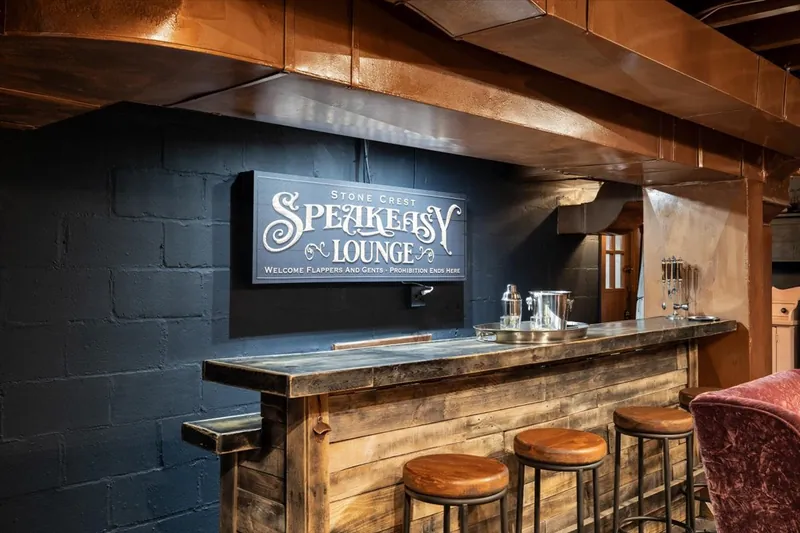 This 1948 home has a speakeasy! Jump into the Prohibition era in comfort. 