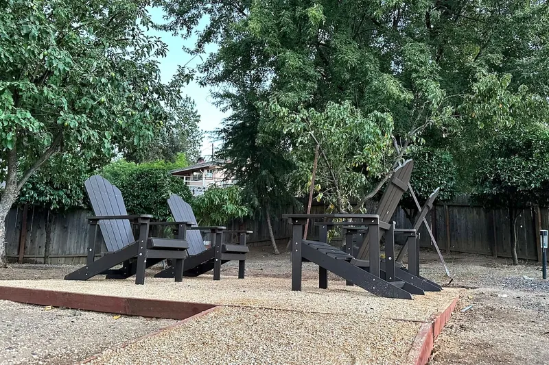 Outdoor seating for four people to watch the stars.